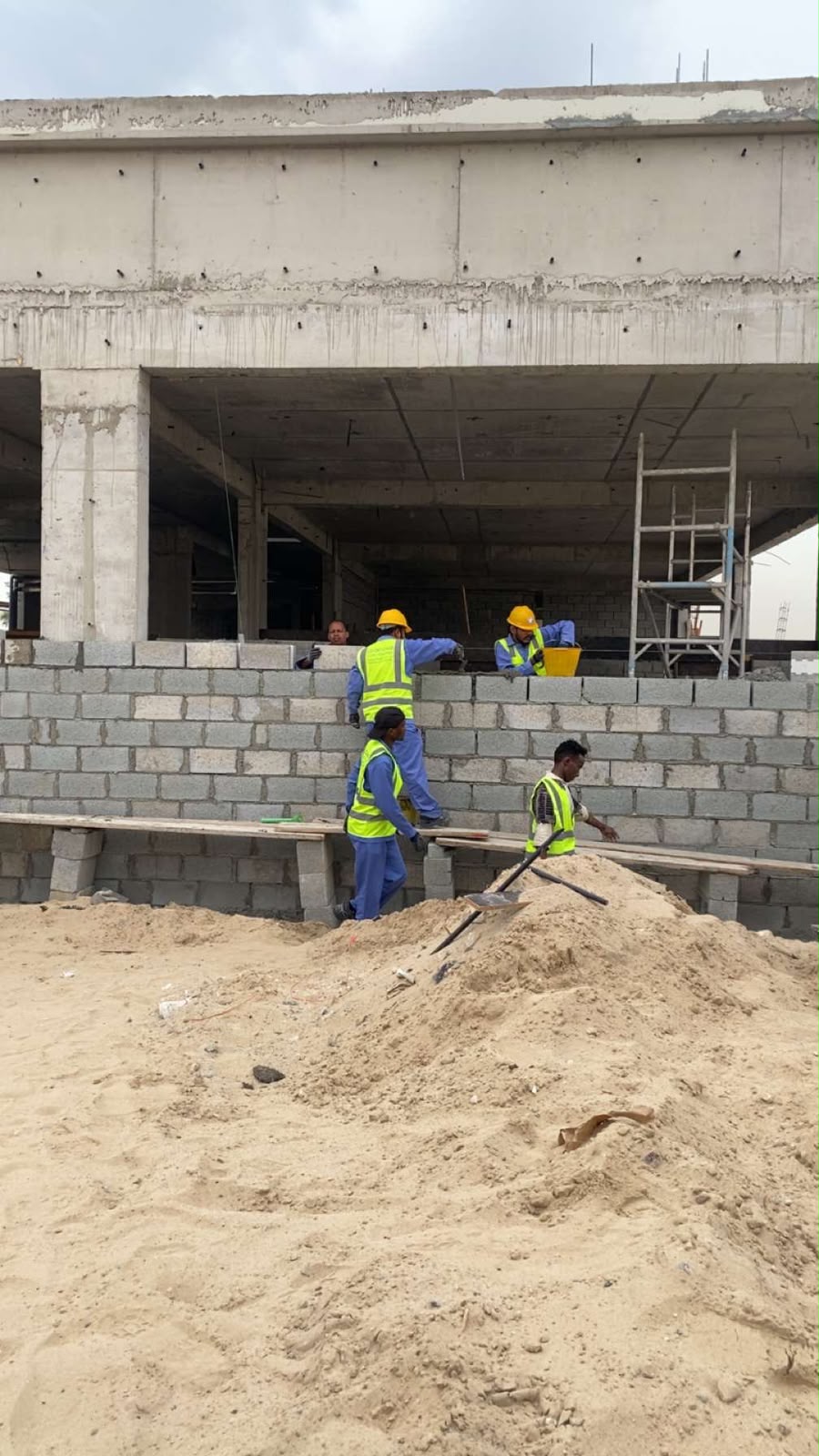 Gionova construction team carrying out blockwork on site in Dubai