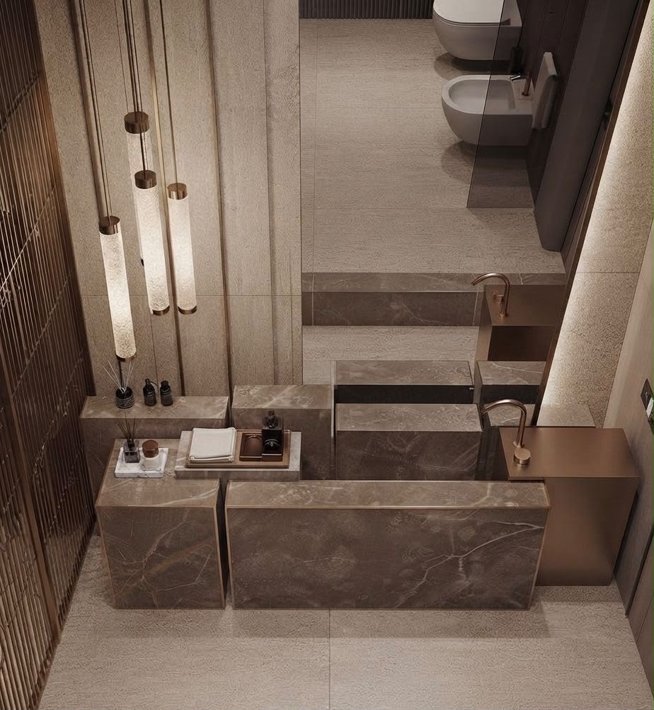 Luna luxury bathroom interior design in Dubai with stone vanity, warm metal fixtures and pendant lighting