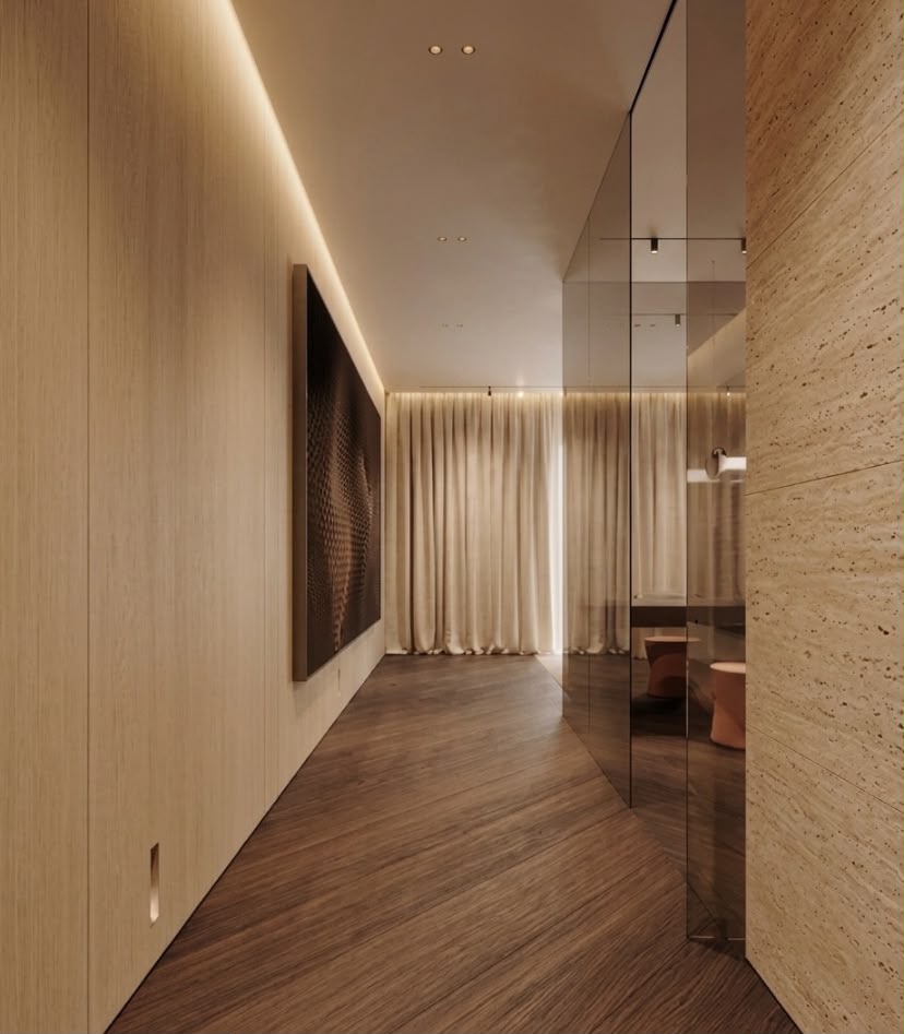 Opus residential corridor interior in Dubai with warm timber flooring, travertine wall, mirrored partition and concealed architectural lighting