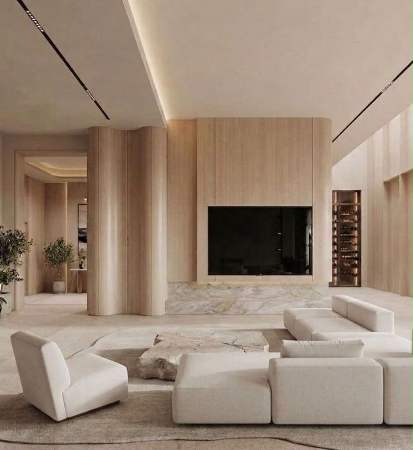 Solara residential living room in Dubai with timber television wall, curved architectural details and neutral contemporary furniture